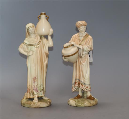 A pair of Royal Worcester blush water carriers